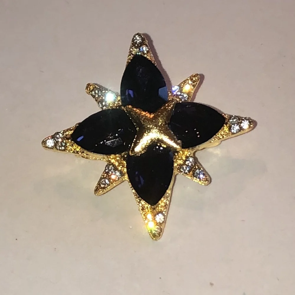 Elegant Gold Tone Purple Starburst Brooch